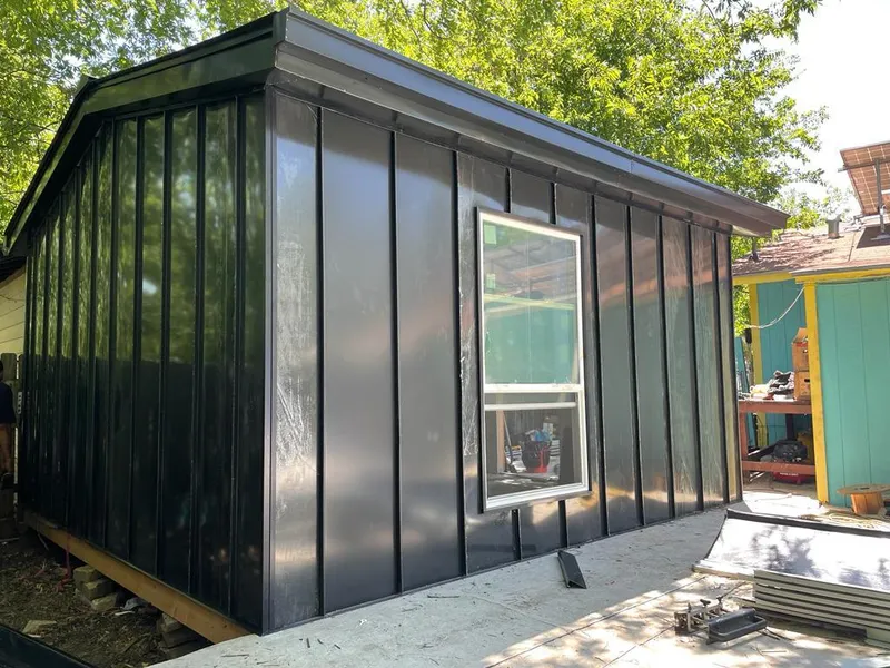 Black standing seam metal wall panels for Metal Roof Installation in Haledon