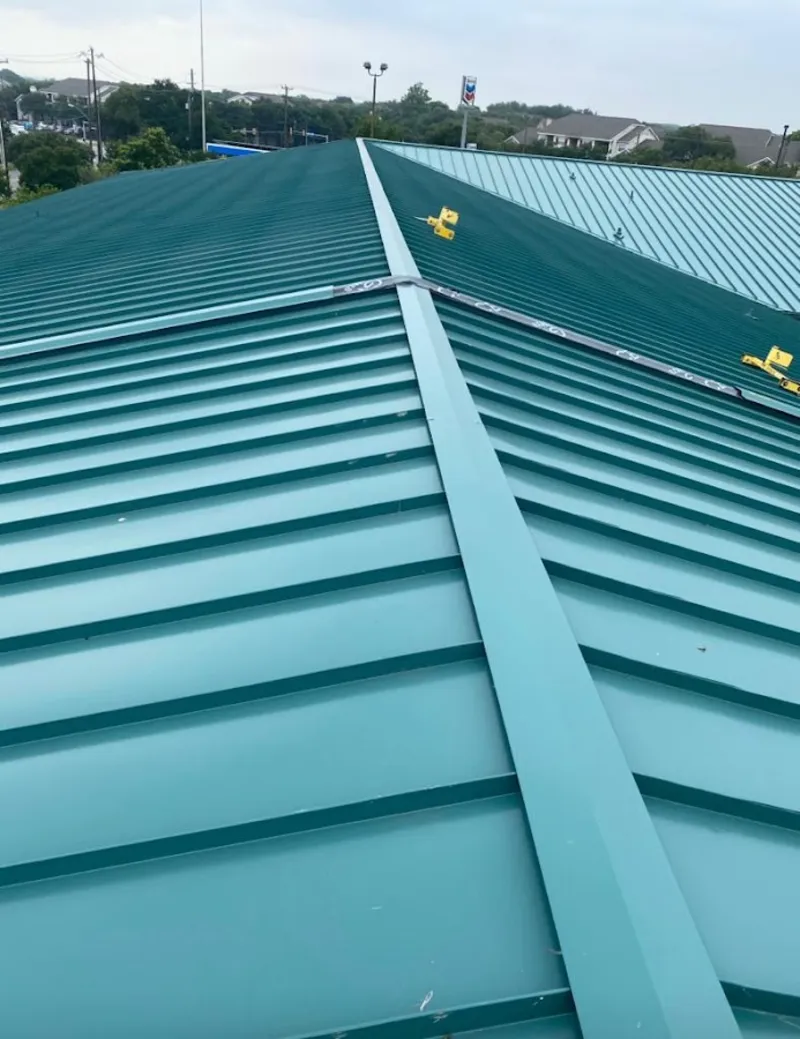 Green commercial metal roof ridge and valley for Metal Roof Repair in Haledon